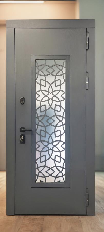 Серая дверь с лазерной резкой Серая дверь с лазерной резкой